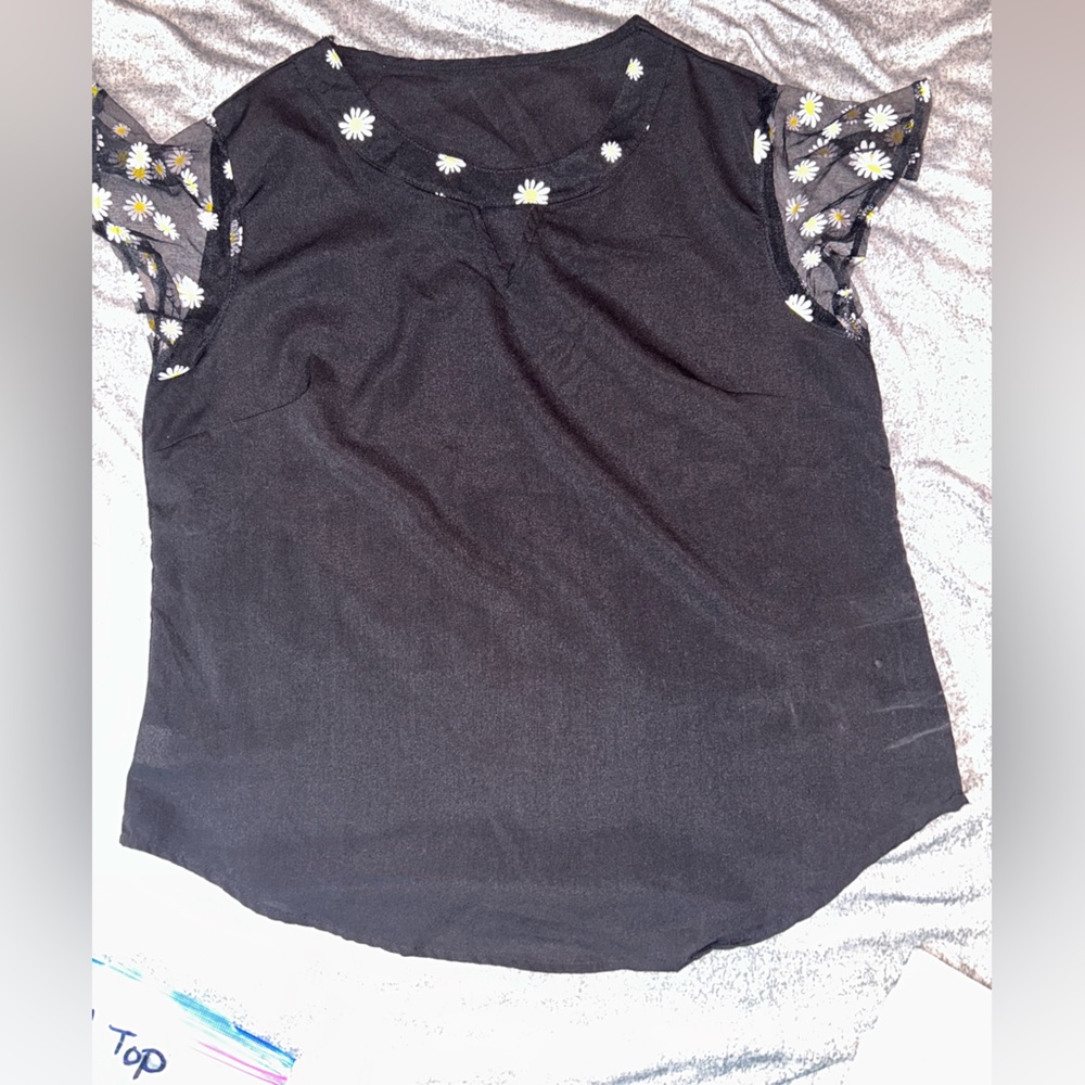 Black Sheer with daisy’s on the sleeves - kids XXL